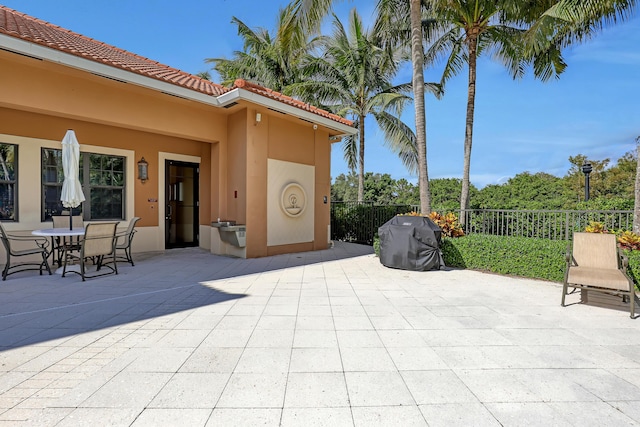 4903 Midtown Ln Unit 3114, Palm Beach Gardens, FL 33418 - view of patio featuring grilling area