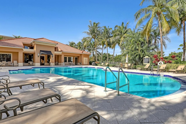 4903 Midtown Ln Unit 3114, Palm Beach Gardens, FL 33418 - community pool with a patio area
