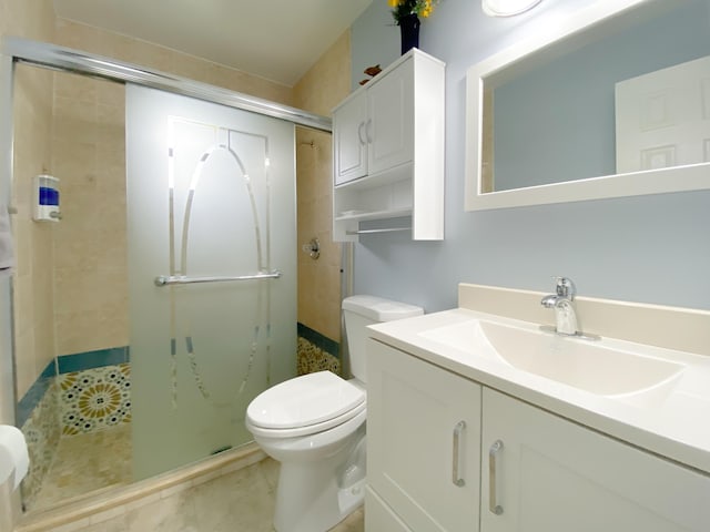 1913 SW Idaho Ln, Port Saint Lucie, FL 34953 - full bath featuring vanity, a shower stall, and toilet