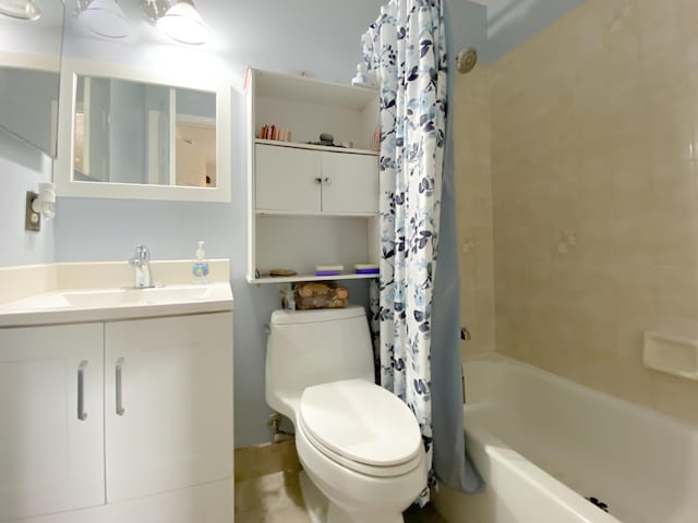 1913 SW Idaho Ln, Port Saint Lucie, FL 34953 - full bath featuring toilet, shower / tub combo, and vanity