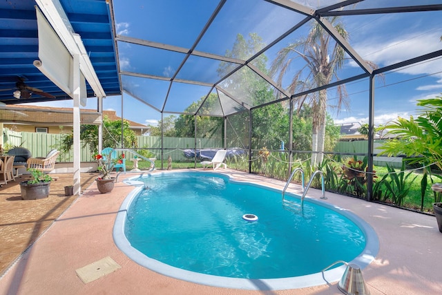 1913 SW Idaho Ln, Port Saint Lucie, FL 34953 - view of pool featuring a patio area, a fenced backyard, a lanai, and a ceiling fan