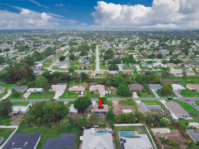 1913 SW Idaho Ln, Port Saint Lucie, FL 34953 - aerial view of property's location featuring nearby suburban area