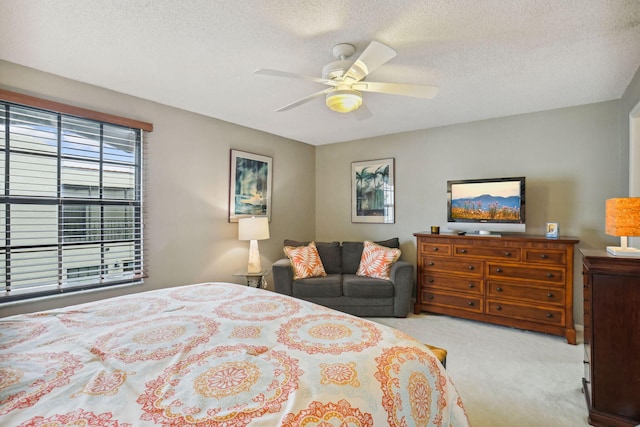 200 S Ocean Blvd Unit B-135, Delray Beach, FL 33483 - bedroom with carpet flooring, a textured ceiling, and a ceiling fan