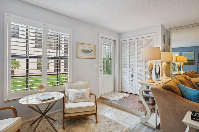 200 S Ocean Blvd Unit B-135, Delray Beach, FL 33483 - foyer with a textured ceiling and tile patterned floors