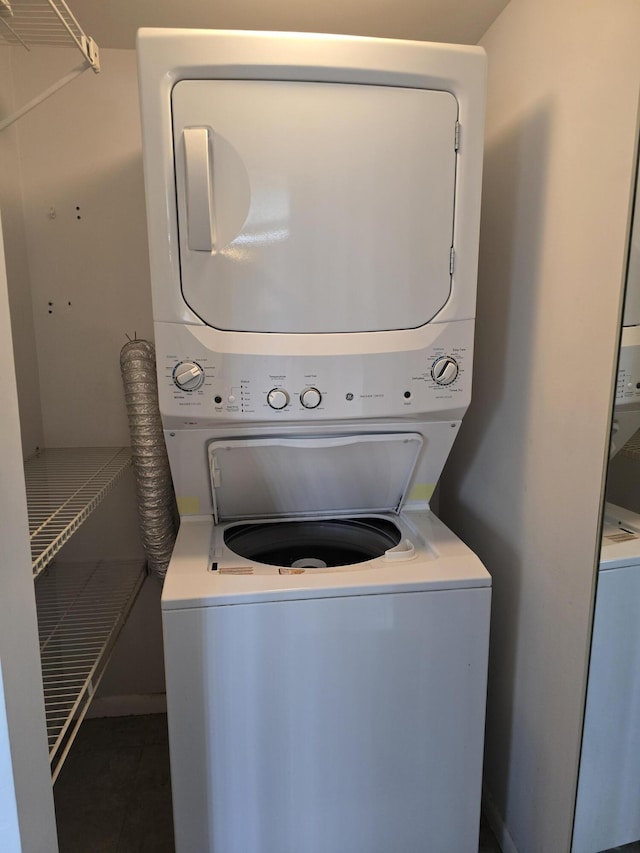 150 Lake Nancy Ln Unit 222, West Palm Beach, FL 33411 - laundry room with stacked washer / drying machine