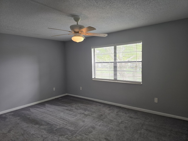 150 Lake Nancy Ln Unit 222, West Palm Beach, FL 33411 - spare room with dark colored carpet, a ceiling fan, baseboards, and a textured ceiling