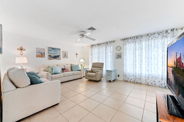 522 Evergreen Dr, Lake Park, FL 33403 - living room with light tile patterned flooring and ceiling fan