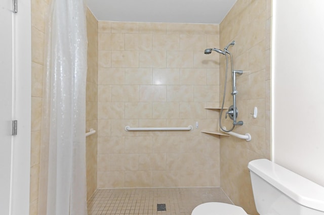 522 Evergreen Dr, Lake Park, FL 33403 - bathroom featuring toilet and a shower stall