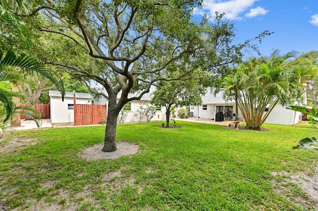 522 Evergreen Dr, Lake Park, FL 33403 - view of yard with a patio area