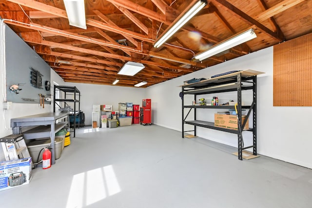 522 Evergreen Dr, Lake Park, FL 33403 - garage featuring baseboards