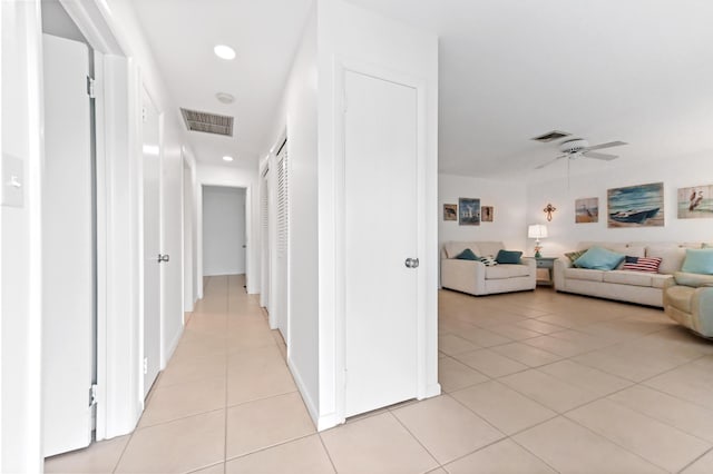 522 Evergreen Dr, Lake Park, FL 33403 - hall featuring light tile patterned floors and recessed lighting