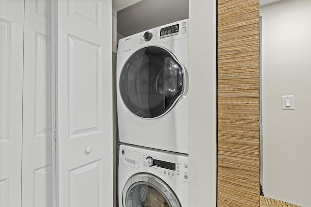 12829 Briarlake Dr Unit 102, Palm Beach Gardens, FL 33418 - washroom featuring stacked washer / dryer