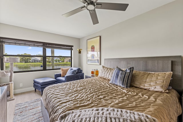 12829 Briarlake Dr Unit 102, Palm Beach Gardens, FL 33418 - bedroom featuring wood finished floors, baseboards, and a ceiling fan