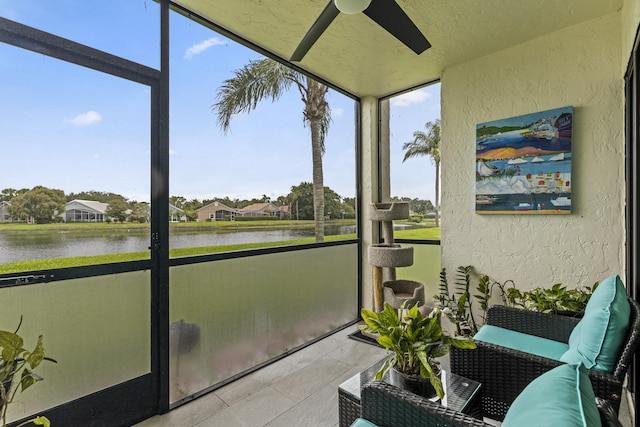 12829 Briarlake Dr Unit 102, Palm Beach Gardens, FL 33418 - sunroom with ceiling fan and a water view