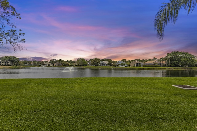 12829 Briarlake Dr Unit 102, Palm Beach Gardens, FL 33418 - water view featuring nearby suburban area