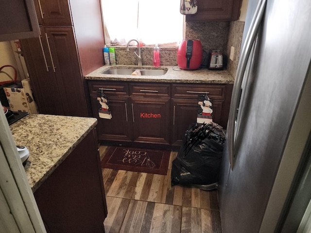 12845 NE 4th Ave, North Miami, FL 33161 - bathroom featuring wood finished floors and decorative backsplash