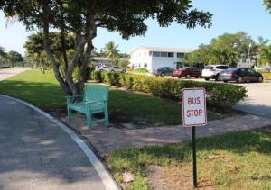 127 Berkshire F, West Palm Beach, FL 33417 - view of community with uncovered parking and a yard