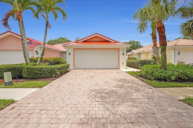 889 SW Balmoral Trce, Stuart, FL 34997 - single story home featuring decorative driveway, a garage, and stucco siding