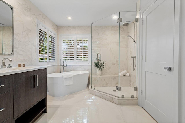 3356 NW 24th Way, Boca Raton, FL 33431 - full bath with a marble finish shower, a freestanding bath, tile walls, vanity, and tile patterned flooring