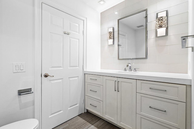 3356 NW 24th Way, Boca Raton, FL 33431 - bathroom featuring vanity and decorative backsplash