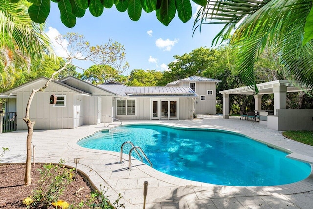 3356 NW 24th Way, Boca Raton, FL 33431 - outdoor pool featuring french doors and a patio area