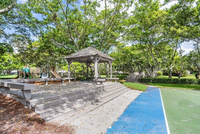 3356 NW 24th Way, Boca Raton, FL 33431 - view of community with a water view and a yard