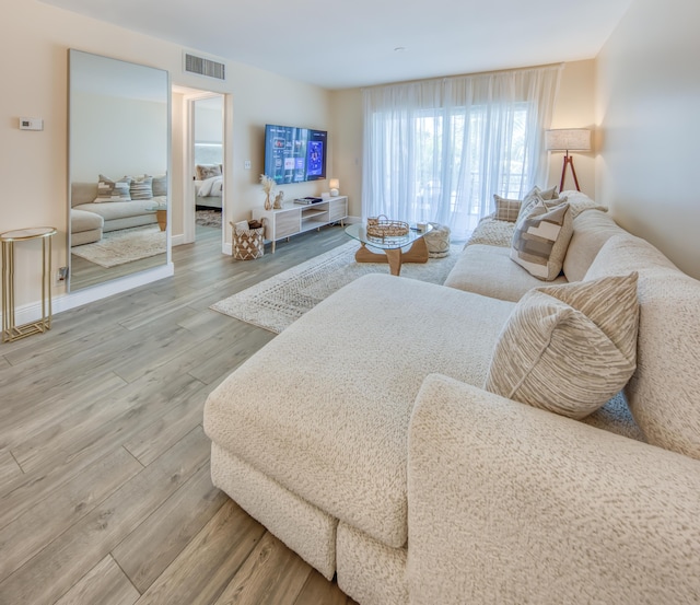 1428 S Lakeside Dr Unit 31, Lake Worth Beach, FL 33460 - living room with wood finished floors