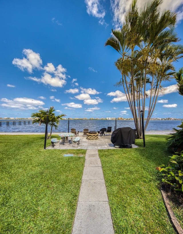 1428 S Lakeside Dr Unit 31, Lake Worth Beach, FL 33460 - water view with a fire pit