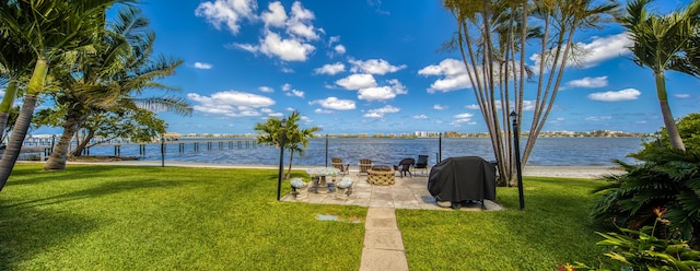 1428 S Lakeside Dr Unit 31, Lake Worth Beach, FL 33460 - water view with a fire pit