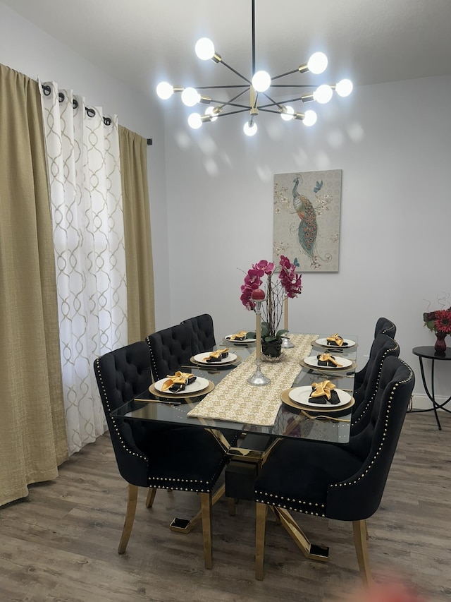 1583 SW Harbour Isles Cir Unit 57, Port Saint Lucie, FL 34986 - dining room featuring a chandelier and wood finished floors