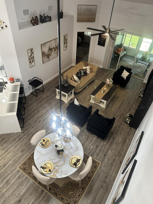1583 SW Harbour Isles Cir Unit 57, Port Saint Lucie, FL 34986 - living room featuring wood finished floors and baseboards