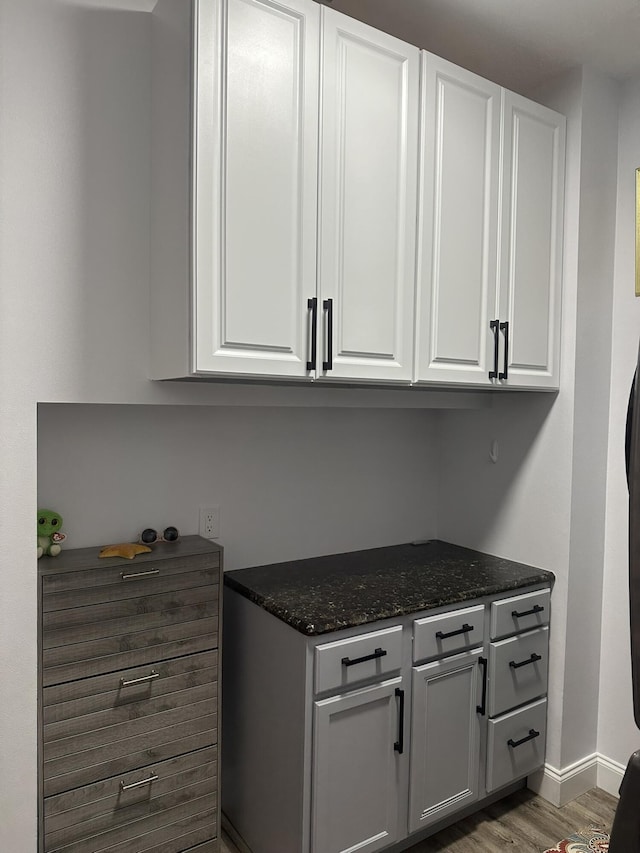 1583 SW Harbour Isles Cir Unit 57, Port Saint Lucie, FL 34986 - detailed view of wood finished floors and baseboards