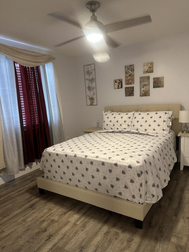 1583 SW Harbour Isles Cir Unit 57, Port Saint Lucie, FL 34986 - bedroom with dark wood-style flooring and ceiling fan