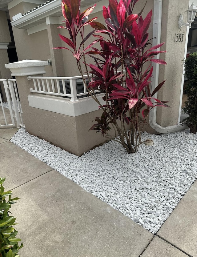 1583 SW Harbour Isles Cir Unit 57, Port Saint Lucie, FL 34986 - view of side of property featuring stucco siding
