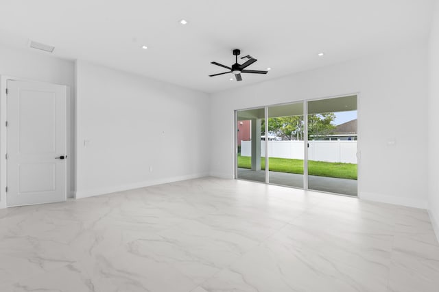 4037 SW Port St Lucie Blvd, Port Saint Lucie, FL 34953 - empty room featuring marble look tiles, baseboards, ceiling fan, and recessed lighting