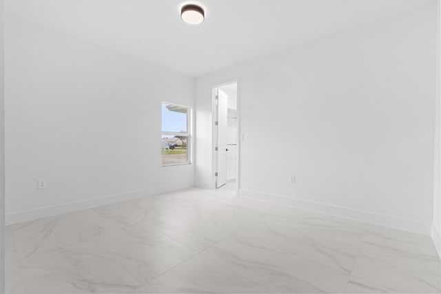 4037 SW Port St Lucie Blvd, Port Saint Lucie, FL 34953 - unfurnished room with light marble finish floors and baseboards