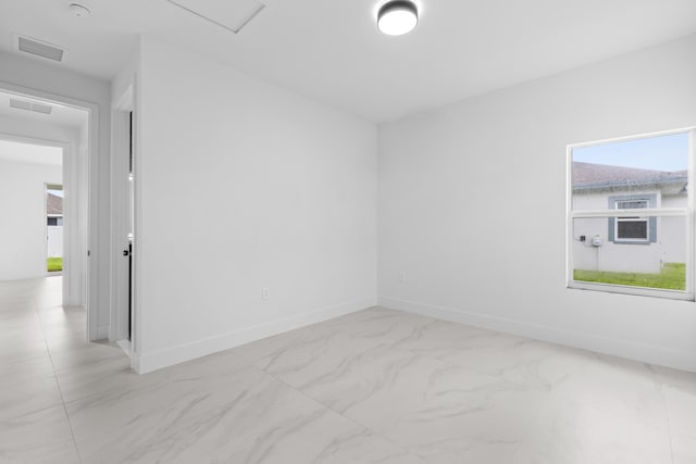 4037 SW Port St Lucie Blvd, Port Saint Lucie, FL 34953 - spare room with marble finish flooring and baseboards