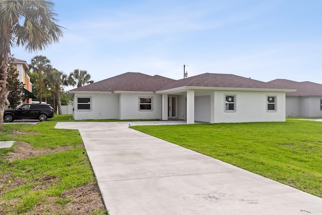 4037 SW Port St Lucie Blvd, Port Saint Lucie, FL 34953 - view of front of house featuring driveway, stucco siding, and a front lawn