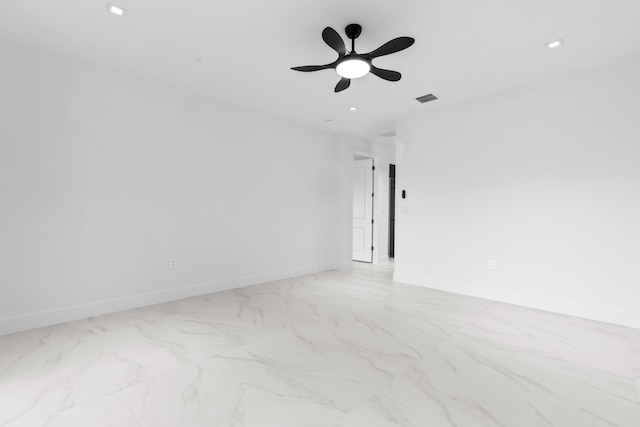 4037 SW Port St Lucie Blvd, Port Saint Lucie, FL 34953 - empty room with light marble finish flooring, baseboards, and a ceiling fan