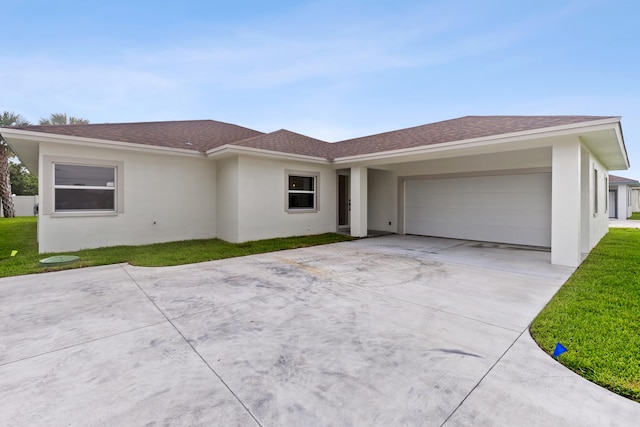 4037 SW Port St Lucie Blvd, Port Saint Lucie, FL 34953 - view of front facade featuring stucco siding, a garage, a shingled roof, and driveway