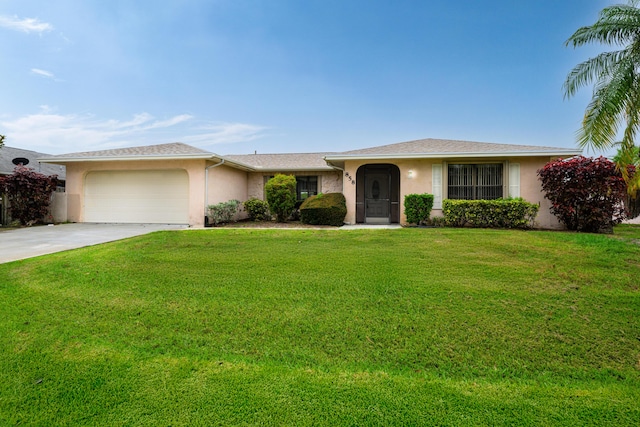 858 SE Roulette Ln, Port Saint Lucie, FL 34983 - view of front of property featuring stucco siding, a garage, driveway, and a front lawn