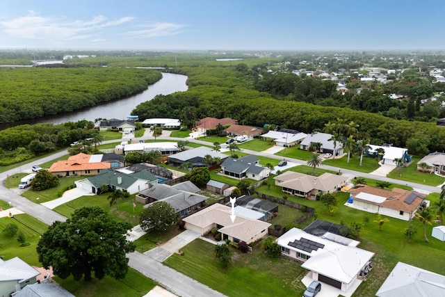 858 SE Roulette Ln, Port Saint Lucie, FL 34983 - aerial view of residential area featuring a nearby body of water