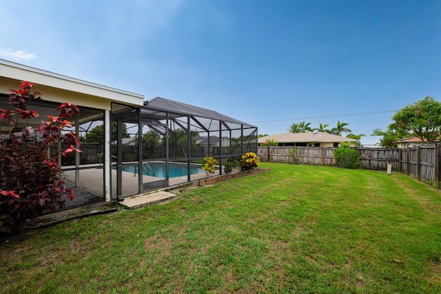 858 SE Roulette Ln, Port Saint Lucie, FL 34983 - view of yard with a lanai