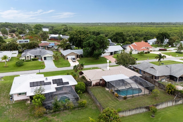 858 SE Roulette Ln, Port Saint Lucie, FL 34983 - aerial perspective of suburban area with a heavily wooded area