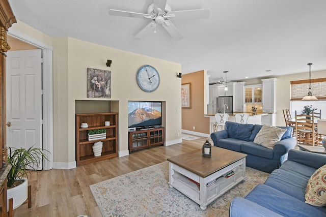 256 Coconut Pt, Jupiter, FL 33458 - living room with ceiling fan, light wood-type flooring, baseboards, and recessed lighting
