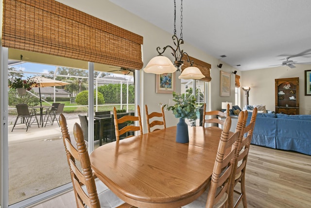 256 Coconut Pt, Jupiter, FL 33458 - dining area featuring plenty of natural light, wood finished floors, and a ceiling fan