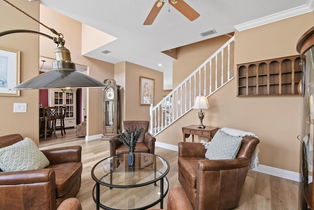 256 Coconut Pt, Jupiter, FL 33458 - living area with ceiling fan, wood finished floors, and stairs