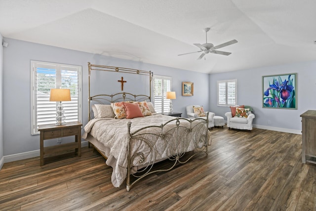 256 Coconut Pt, Jupiter, FL 33458 - bedroom featuring dark wood-style floors, vaulted ceiling, baseboards, and ceiling fan