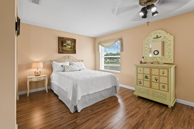 256 Coconut Pt, Jupiter, FL 33458 - bedroom with wood finished floors, baseboards, and a ceiling fan