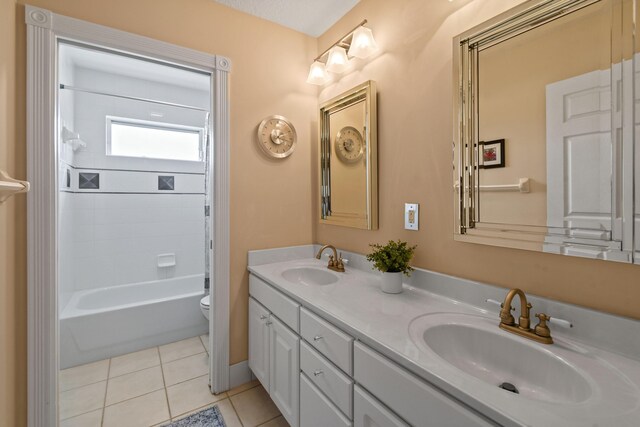 256 Coconut Pt, Jupiter, FL 33458 - bathroom featuring double vanity, toilet, tile patterned floors, and bathing tub / shower combination